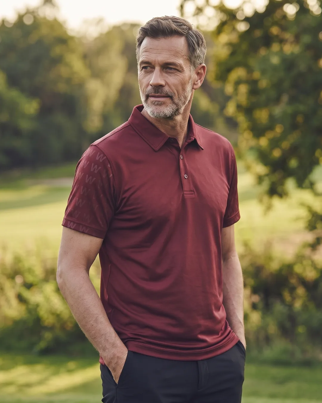Two men in WINWIZE golf polos on the golf course